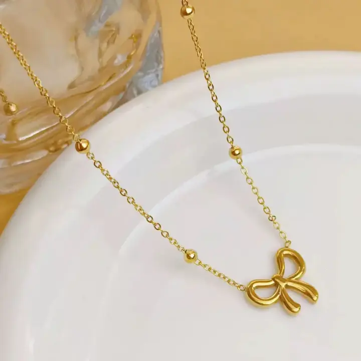 Hollow Bowknot Pendant Necklace